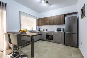 Cucina o angolo cottura di Sunny Modern Apartments