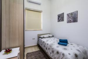 Letto o letti in una camera di Sunny Modern Apartments