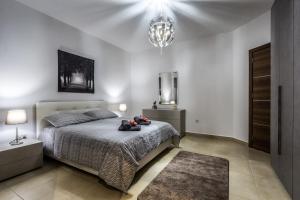 Letto o letti in una camera di Sunny Modern Apartments