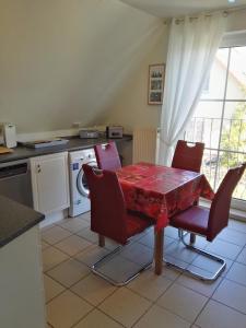 Η κουζίνα ή μικρή κουζίνα στο Ferienwohnung Haus Sommerwind +36 φωτογραφίες