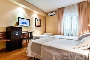 Krevet ili kreveti u jedinici u okviru objekta Hotel Xauen