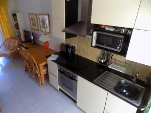A kitchen or kitchenette at Castillo Mar