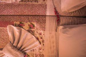 A bed or beds in a room at Roula Apartments