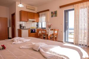 A kitchen or kitchenette at Roula Apartments Még 37 kép