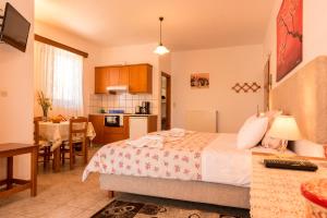A kitchen or kitchenette at Roula Apartments