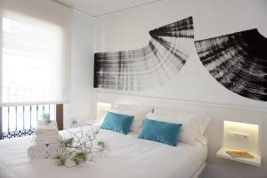 Postel nebo postele na pokoji v ubytování Mardenit Hotel Boutique