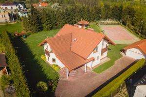 an overhead view of a house with an orange roof at Villa Żywiec in Żywiec
