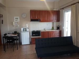 Kuchyň nebo kuchyňský kout v ubytování Cozy Loft