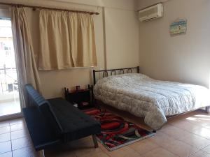 Voodi või voodid majutusasutuse Cozy Loft toas