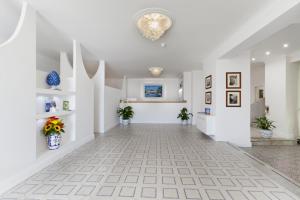 The lobby or reception area at Hotel Piccolo Paradiso Még 29 kép
