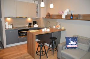 Kuchyňa alebo kuchynka v ubytovaní Apartament z widokiem na morze