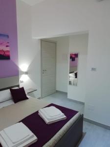 Posteľ alebo postele v izbe v ubytovaní Flamingo Rooms