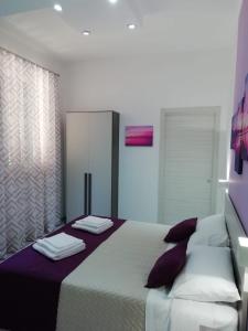 Posteľ alebo postele v izbe v ubytovaní Flamingo Rooms