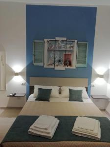 Ένα ή περισσότερα κρεβάτια σε δωμάτιο στο Flamingo Rooms