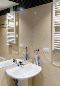 Koupelna v ubytování Cangas Popa