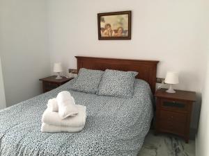 Postel nebo postele na pokoji v ubytování Apartamento céntrico