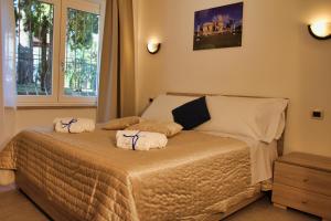 A bed or beds in a room at Residence Bellavista