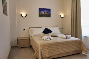 A bed or beds in a room at Residence Bellavista