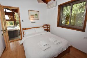 Letto o letti in una camera di Zimmers at the Forest
