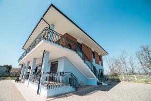 a building with a staircase on the side of it at Ca' del Viaggiatore in Farigliano