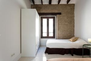 Postel nebo postele na pokoji v ubytování Almazen apartamentos, Arrayan 23