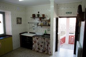 Majoituspaikan Villa Albino keittiö tai keittotila