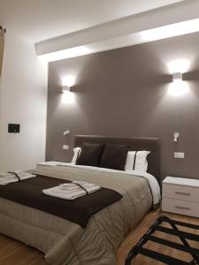 Postel nebo postele na pokoji v ubytování Gocce di Girgenti - comfort suites