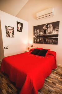 מיטה או מיטות בחדר ב-Suite del Amore