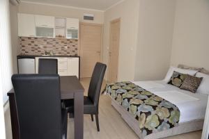 Postel nebo postele na pokoji v ubytování Apartments Mianiko