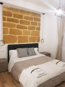 Postel nebo postele na pokoji v ubytování Gocce di Girgenti - comfort suites
