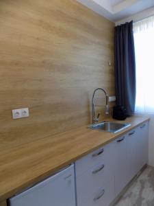 Kuchyňa alebo kuchynka v ubytovaní Petite Palace Aristotelous 8