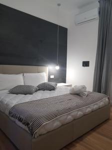 Postel nebo postele na pokoji v ubytování Gocce di Girgenti - comfort suites