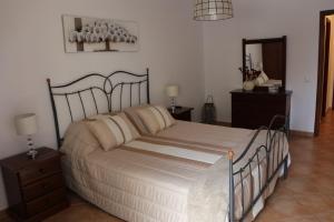 En eller flere senge i et værelse på Praia da Rocha, Algarve Sunny Apartment + 23 billeder