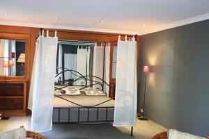 Llit o llits en una habitació de Le portail des Ardennes