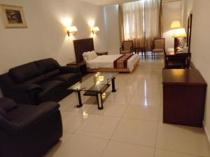 Uma área de estar em Excelsior Resort