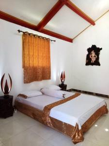 Llit o llits en una habitació de Villa Rikna