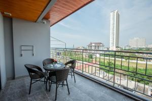 Balkón nebo terasa v ubytování Golden Jomtien Beach Hotel