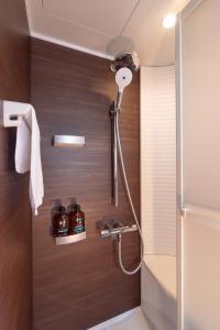 Koupelna v ubytování Uhome Iriya Apartment + 37 fotografií