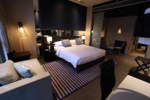 The Abdali Boulevard Hotel客房内的一张或多张床位