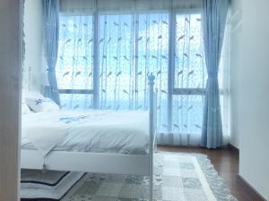 Postel nebo postele na pokoji v ubytování Pattaya Private Beach Luxury Home