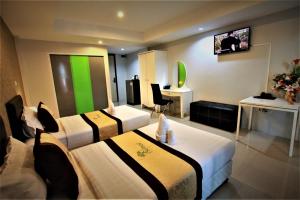 TV a/nebo společenská místnost v ubytování Retreat Resort Pattaya