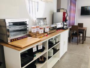 Kuchyň nebo kuchyňský kout v ubytování Itaca Artemisa by Soho Boutique