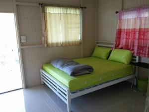 Postel nebo postele na pokoji v ubytování Ban Chomdoi Resort PhaTang