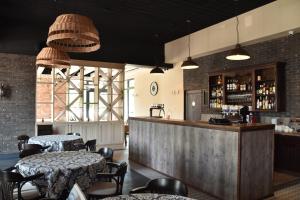 Lounge alebo bar v ubytovaní KOLOBRZEG apartamenty GREG POLANKI