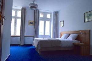 Postel nebo postele na pokoji v ubytování Apartamenty Next to Galeria Katowice