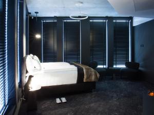 Posteľ alebo postele v izbe v ubytovaní The Loft Hotel Adults Only