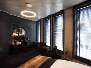 Posteľ alebo postele v izbe v ubytovaní The Loft Hotel Adults Only