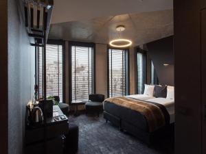 Posteľ alebo postele v izbe v ubytovaní The Loft Hotel Adults Only