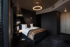 Posteľ alebo postele v izbe v ubytovaní The Loft Hotel Adults Only