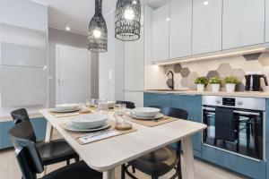 Kuchyňa alebo kuchynka v ubytovaní Elite Apartments City Center Suites